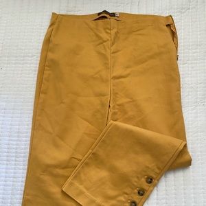 Size 4, business casual pants. Ankle flare. Button detail.